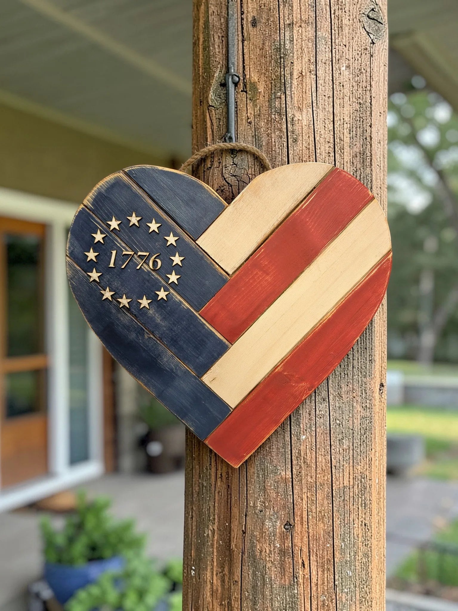 Rustic wooden American flag heart with 1776 star detail