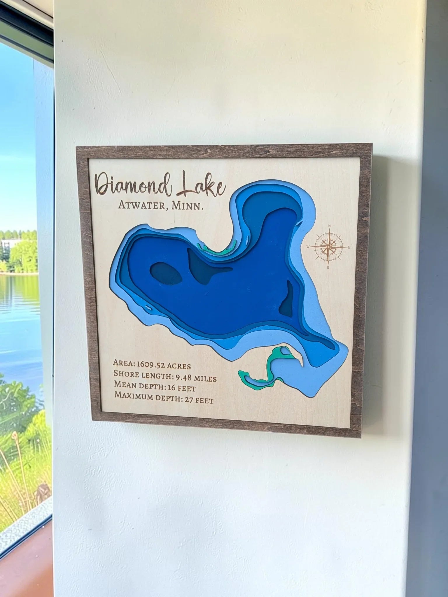 Personalized Diamond Lake depth map displayed on a wall