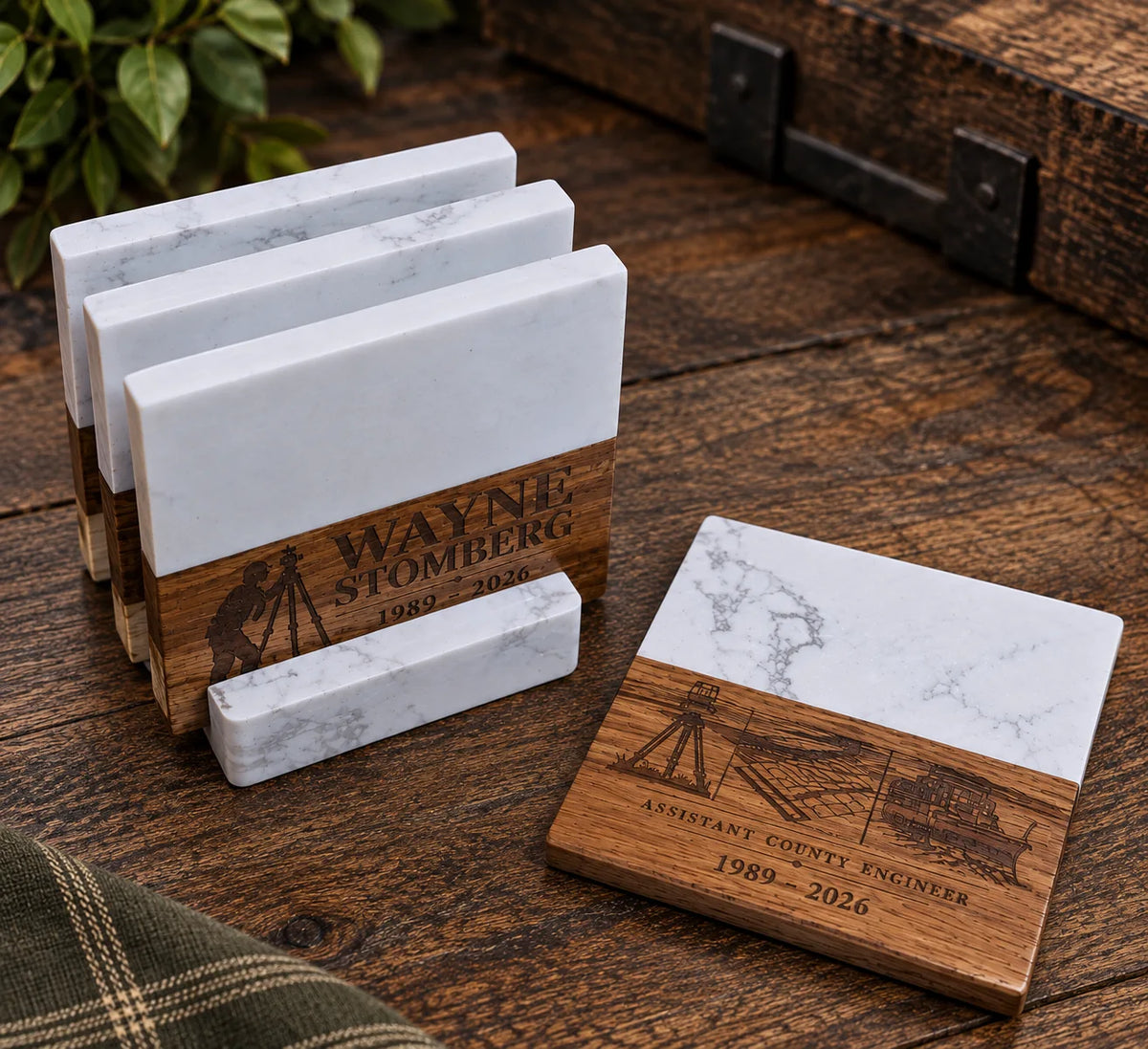 a group of marble coasters on a wood surface